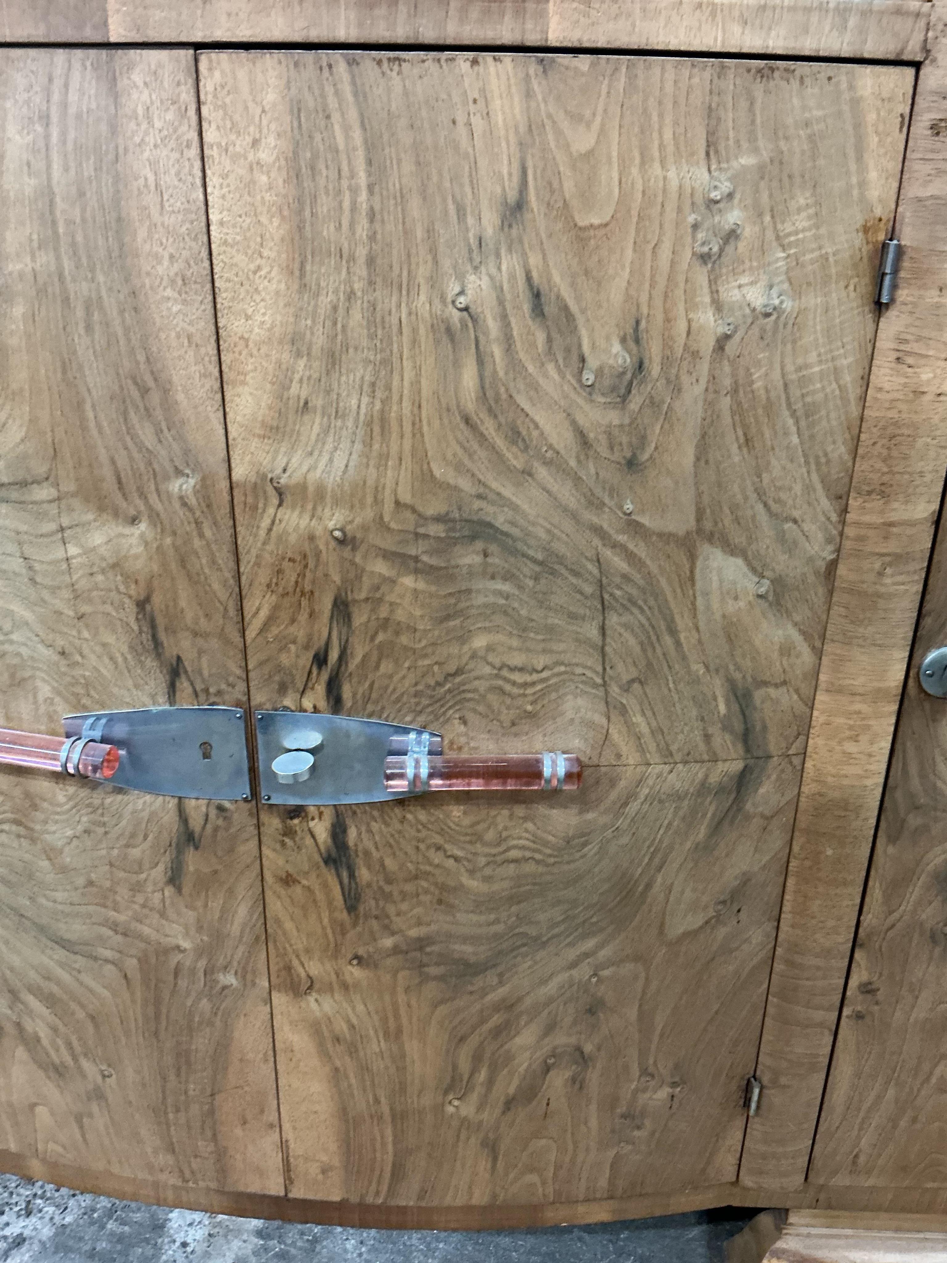 An Art Deco walnut marble topped bow front sideboard, width 158cm, depth 50cm, height 110cm